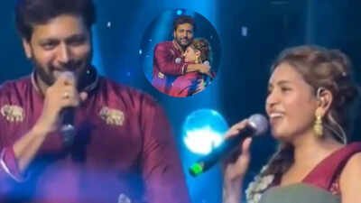 Ravi Mohan hugs Kenishaa after romantic song performance on stage: adorable expressions by ‘Parasakthi’ actor caught on camera | Tamil Movie News