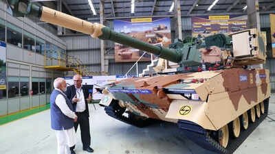 PM Modi inspects indigenous defence systems at Surat facility, briefed about desi light tank Zorawar | India News